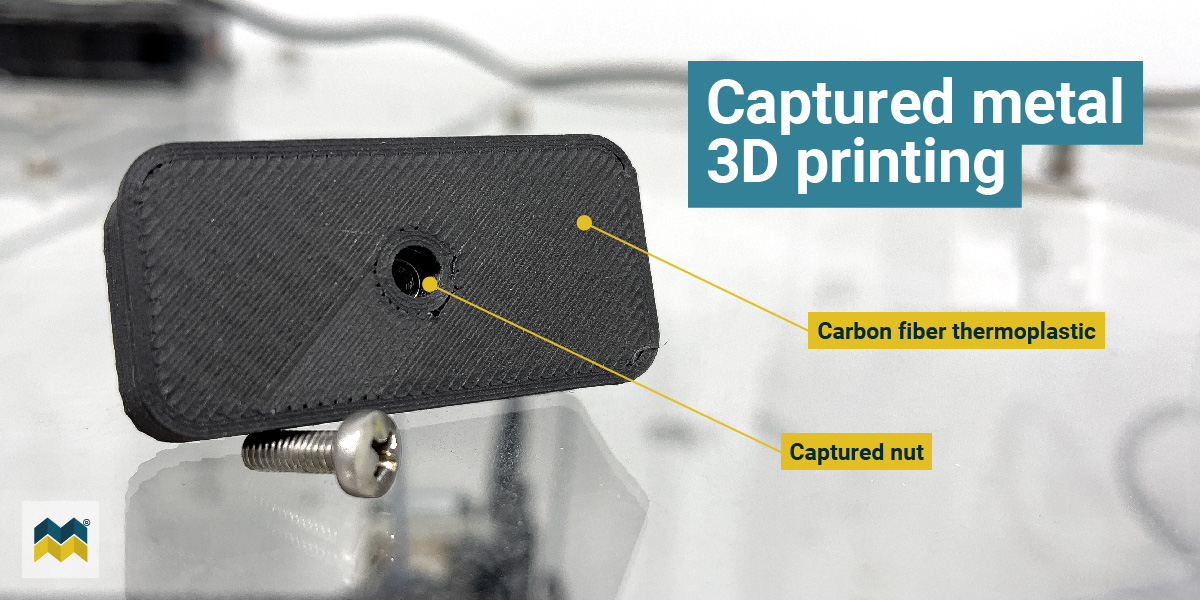 a captured nut within a carbon fiber thermoplastic 3D printed part. Arrows point to each component.