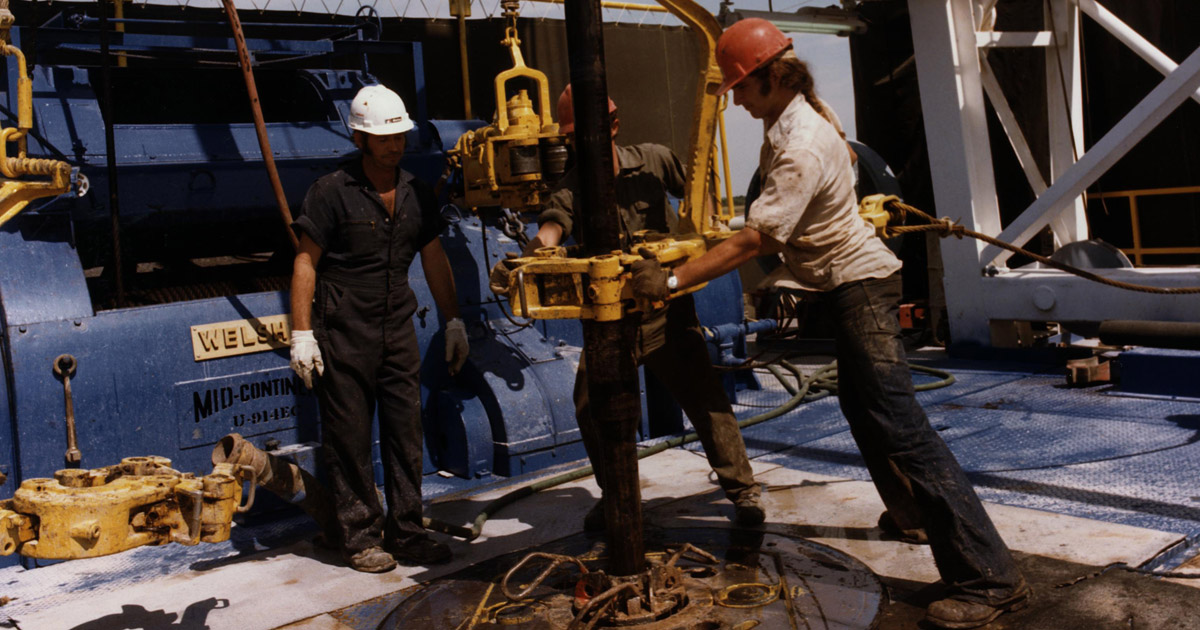 workers drilling a geothermal well