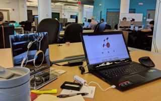 laptop set up at masschallenge co-working space